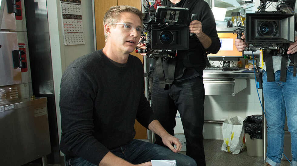 Director with two camera man in a Tyson test kitchen